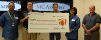 MC Assembly Donates More Than $31,000 to Local Kids Without Christmas Charity
